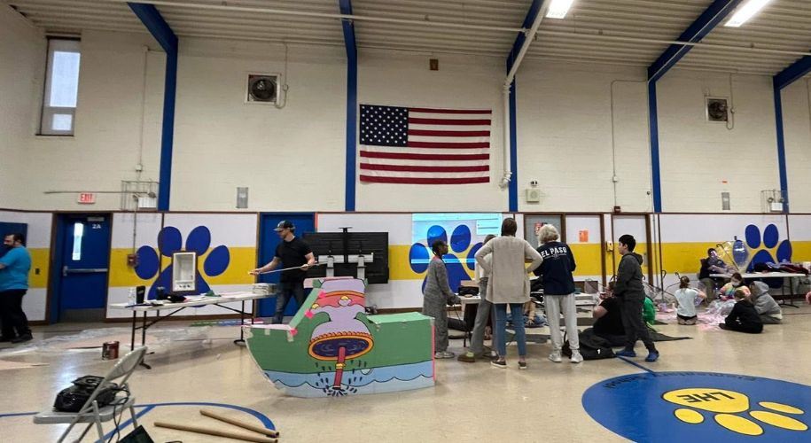  Students, parents, and staff work together to build sets and props for Finding Nemo Kids